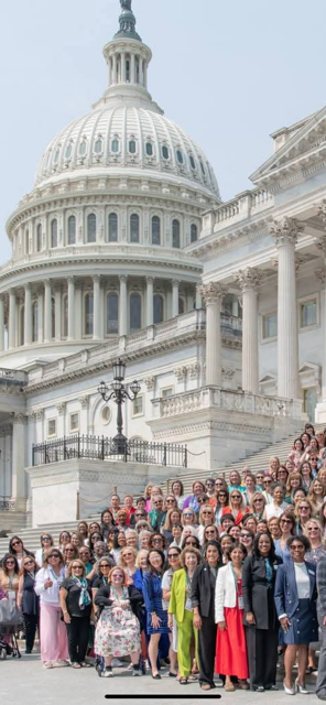 NAWBO members on Capitol Hill in Washington DC advocating for women in business issues (Margot Murphy pictured middle of group, red jacket)