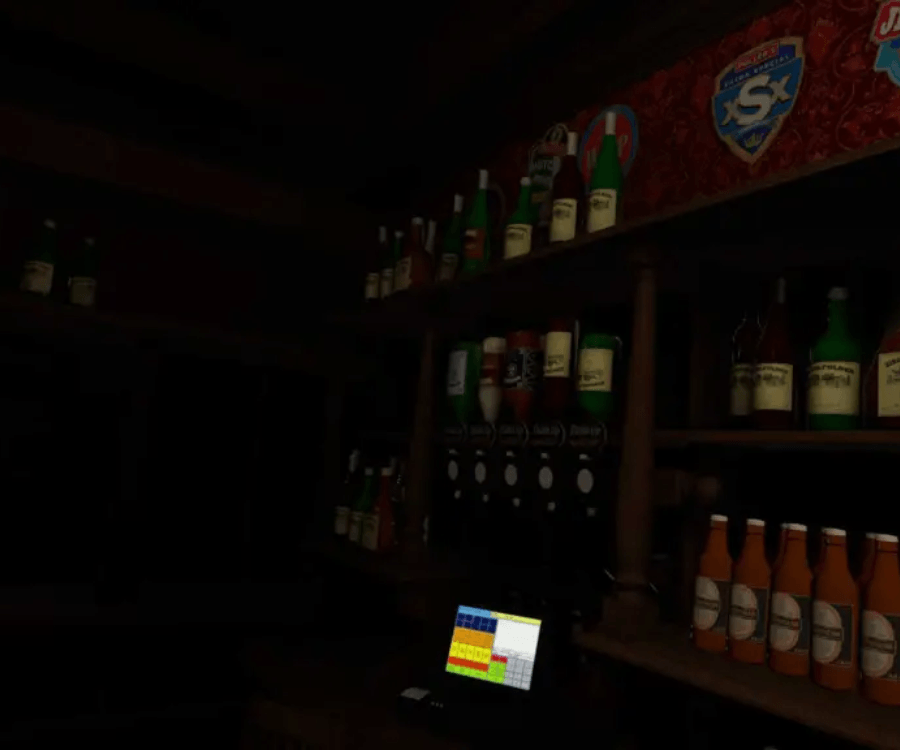 A store filled with lots of bottles of alcohol and a computer.