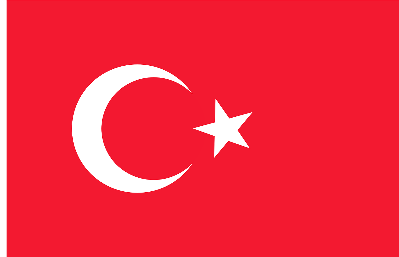 The flag of turkey has a crescent moon and a star on it.