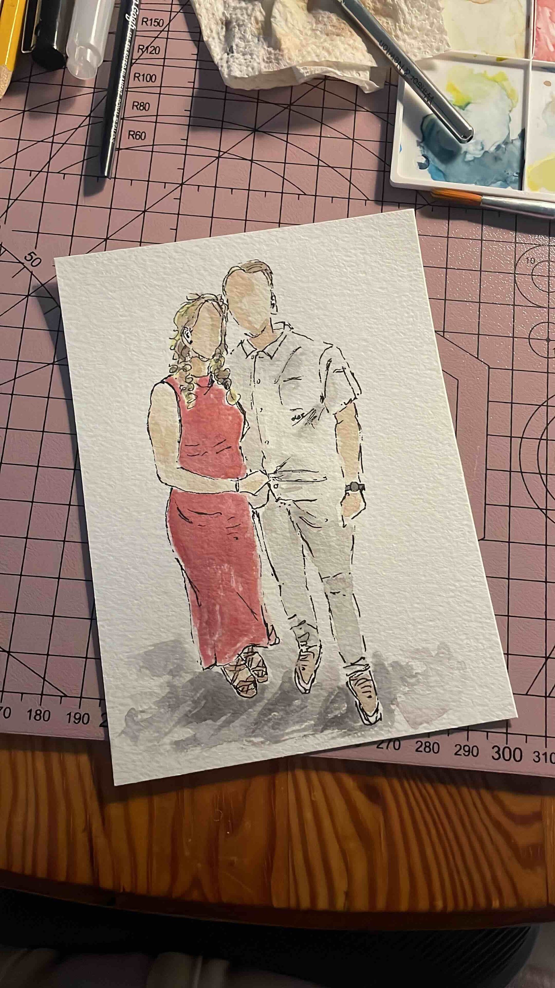 Aquarel portret van een omhelzend stel; de vrouw in een rode jurk, de man in witte kleding.
