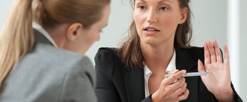 Two female lawyers in discussion