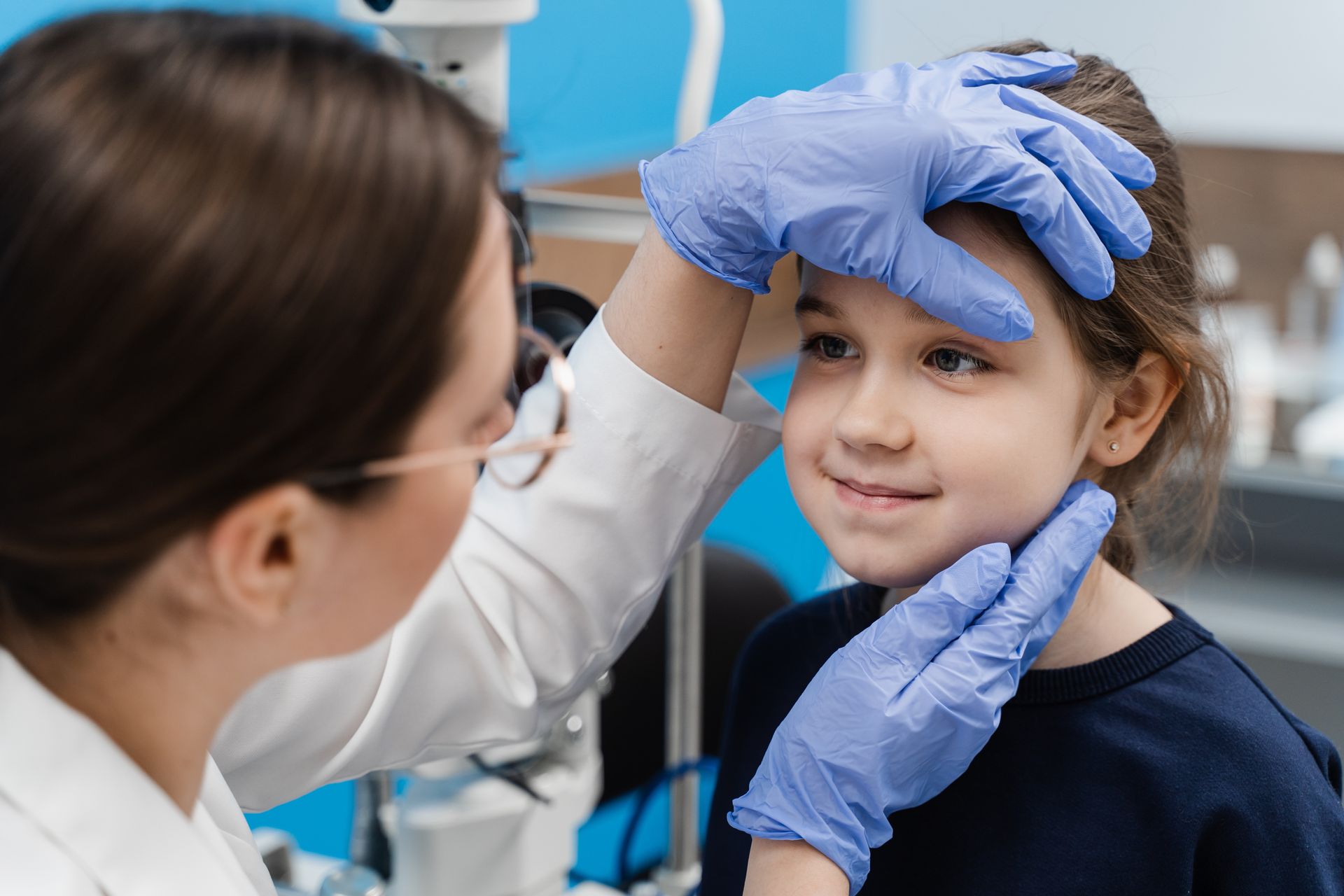 A doctor is examining a child.