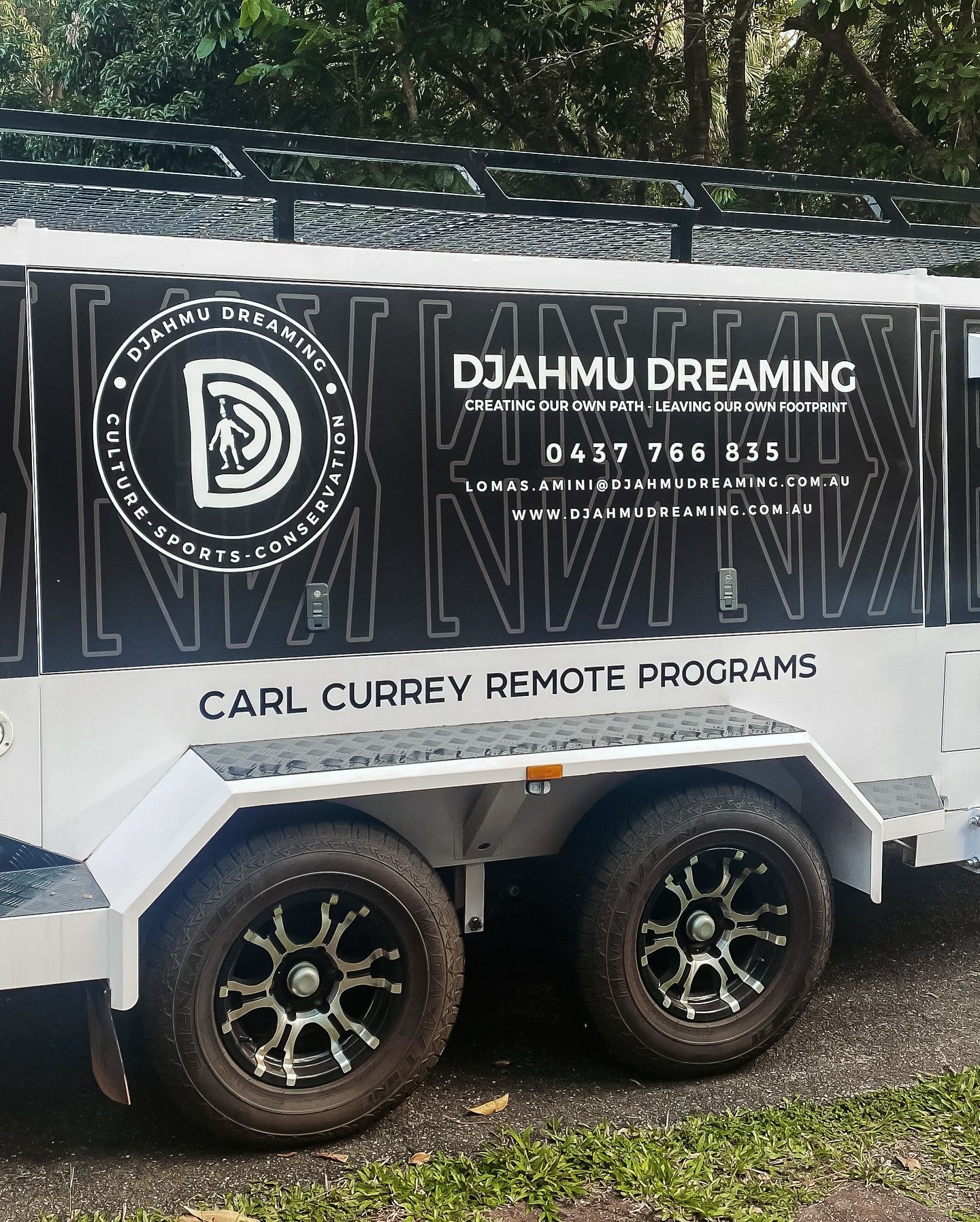 White Trailer With Black Detailing — Millard Signs in Portsmith, QLD