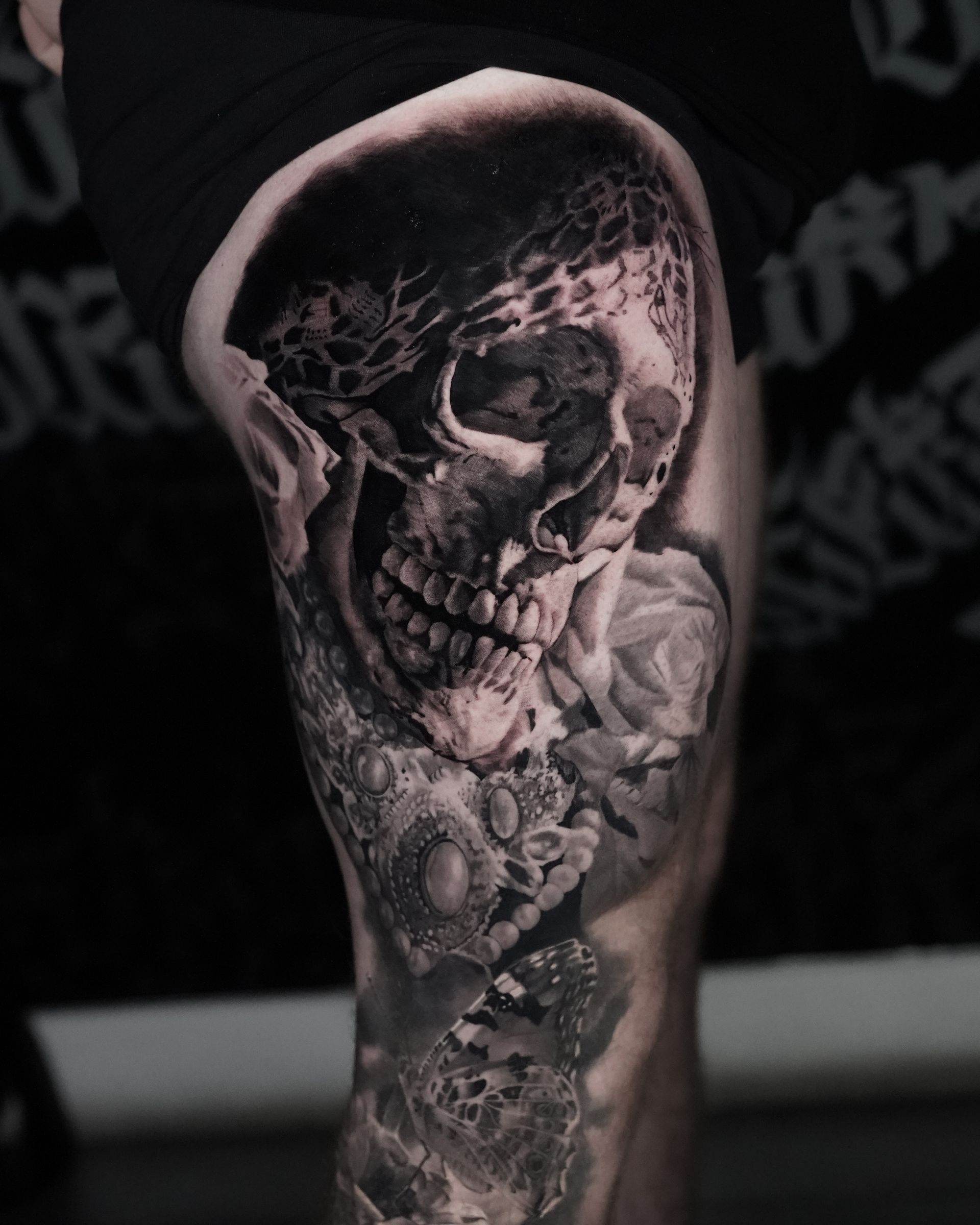 top black and grey realism tattooists london
