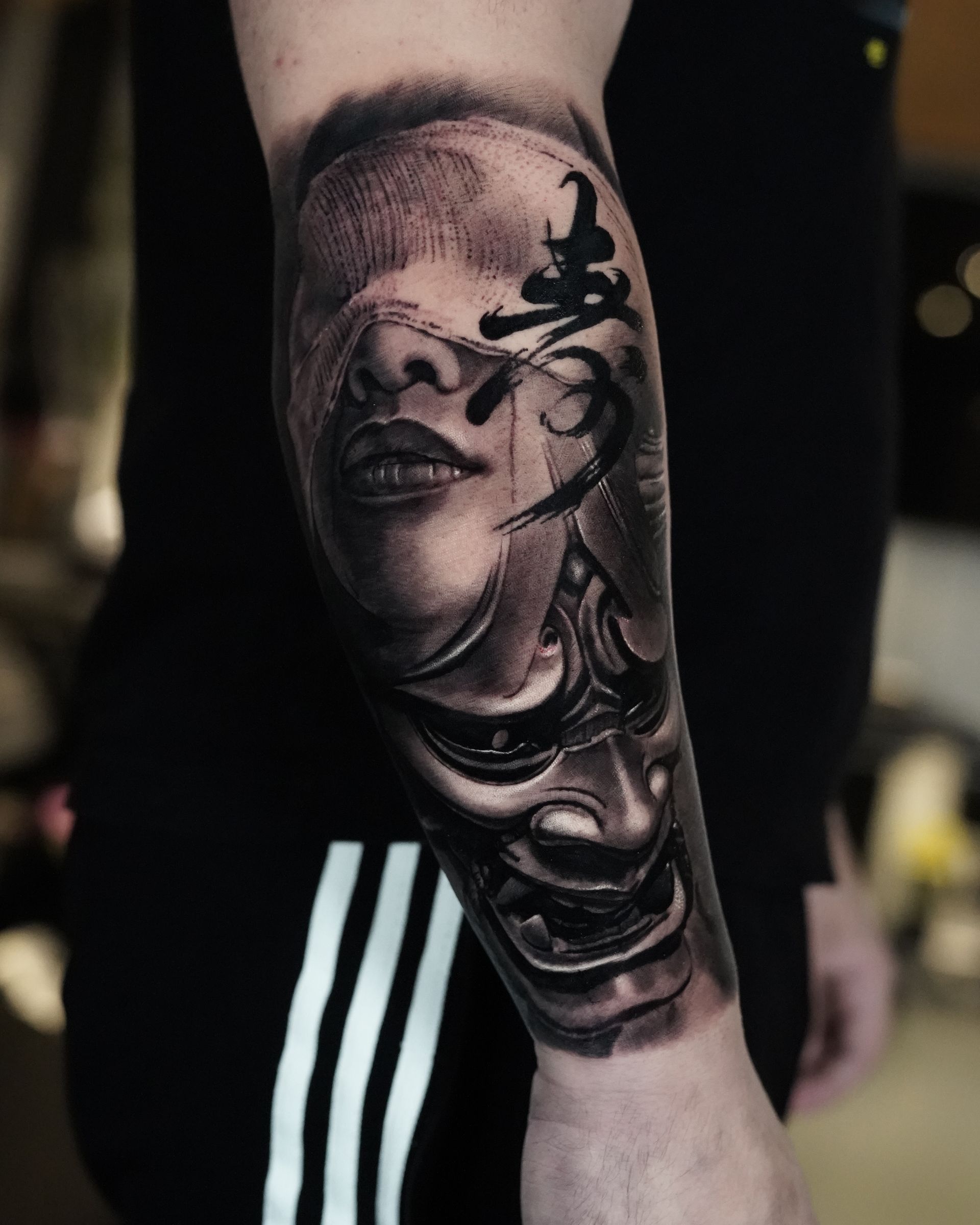 black & grey realistic tattoo london