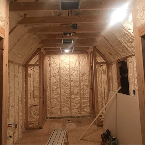 A room with a lot of insulation on the walls and ceiling.