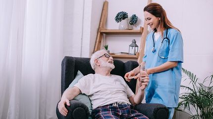 nurse with older patient