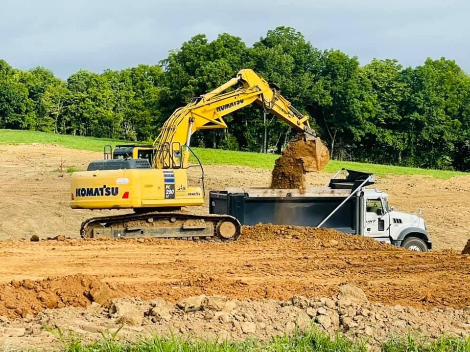 Bulldozer Is Working On A Dirt Road — Milton, KY — B&N Land Management LLC