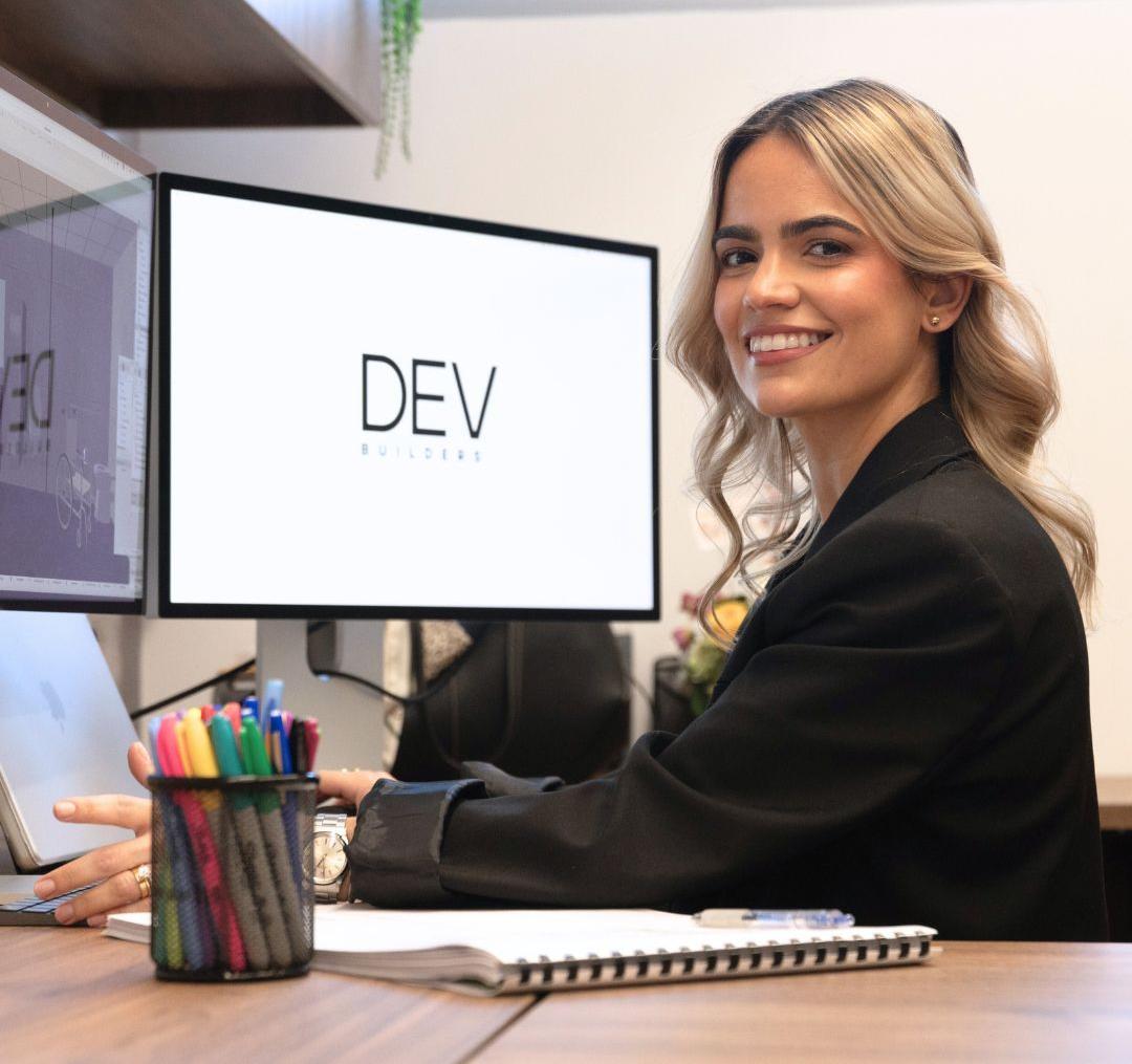 DEV Builders Group Employee viewing blueprints