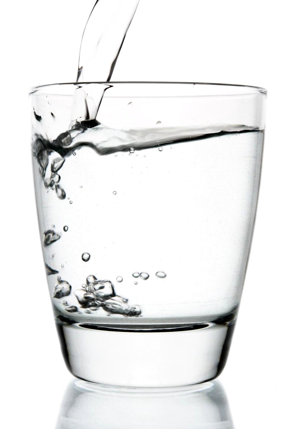 A glass of water is being poured into it