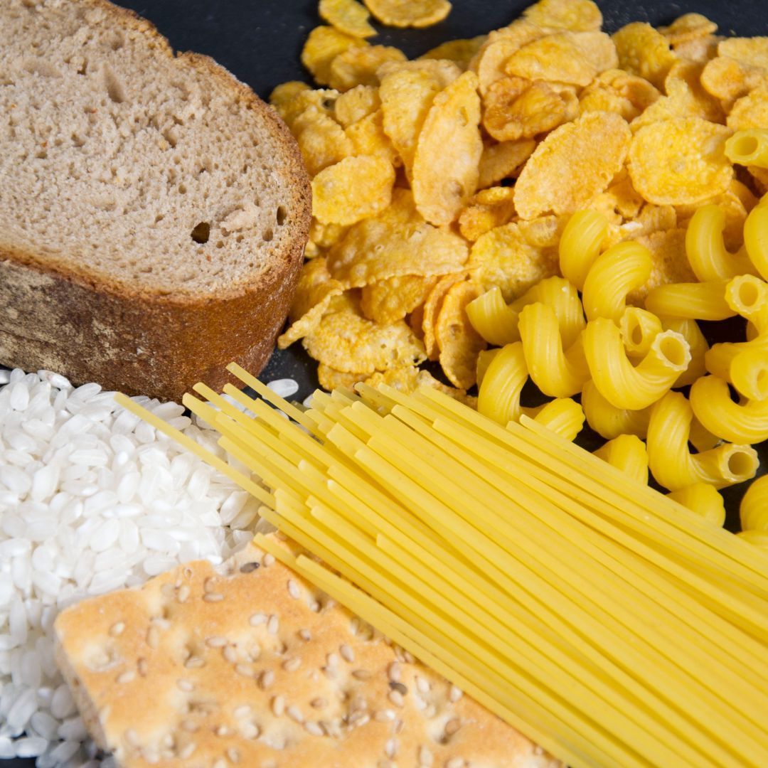 A variety of food including macaroni and cheese crackers and bread