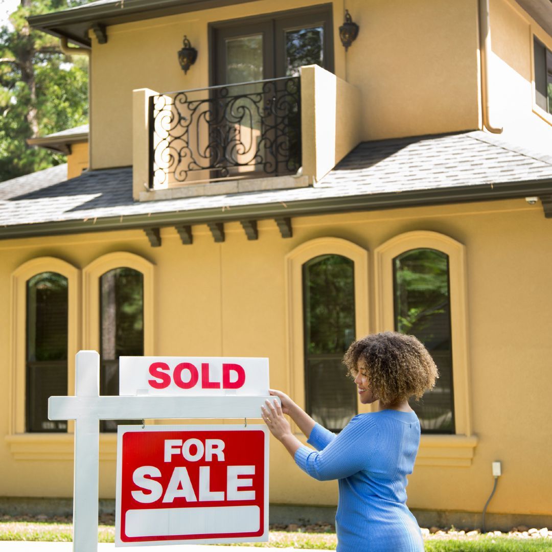 Sold sign outside property development in Los Angeles amidst the housing shortage.