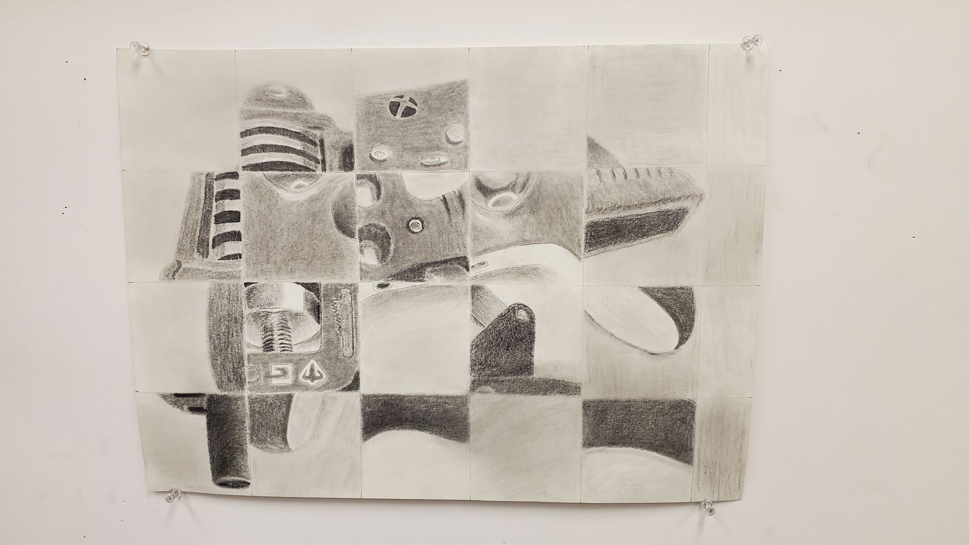 Pencil drawing of various objects arranged in a grid; a checkerboard of items.