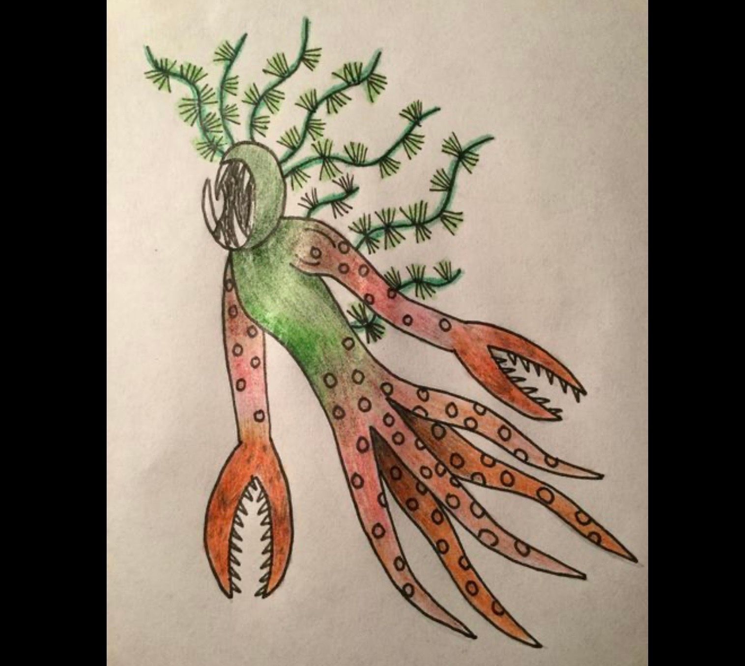 A green and orange monster with a toothy mouth, plant-like hair, and claw-like arms.