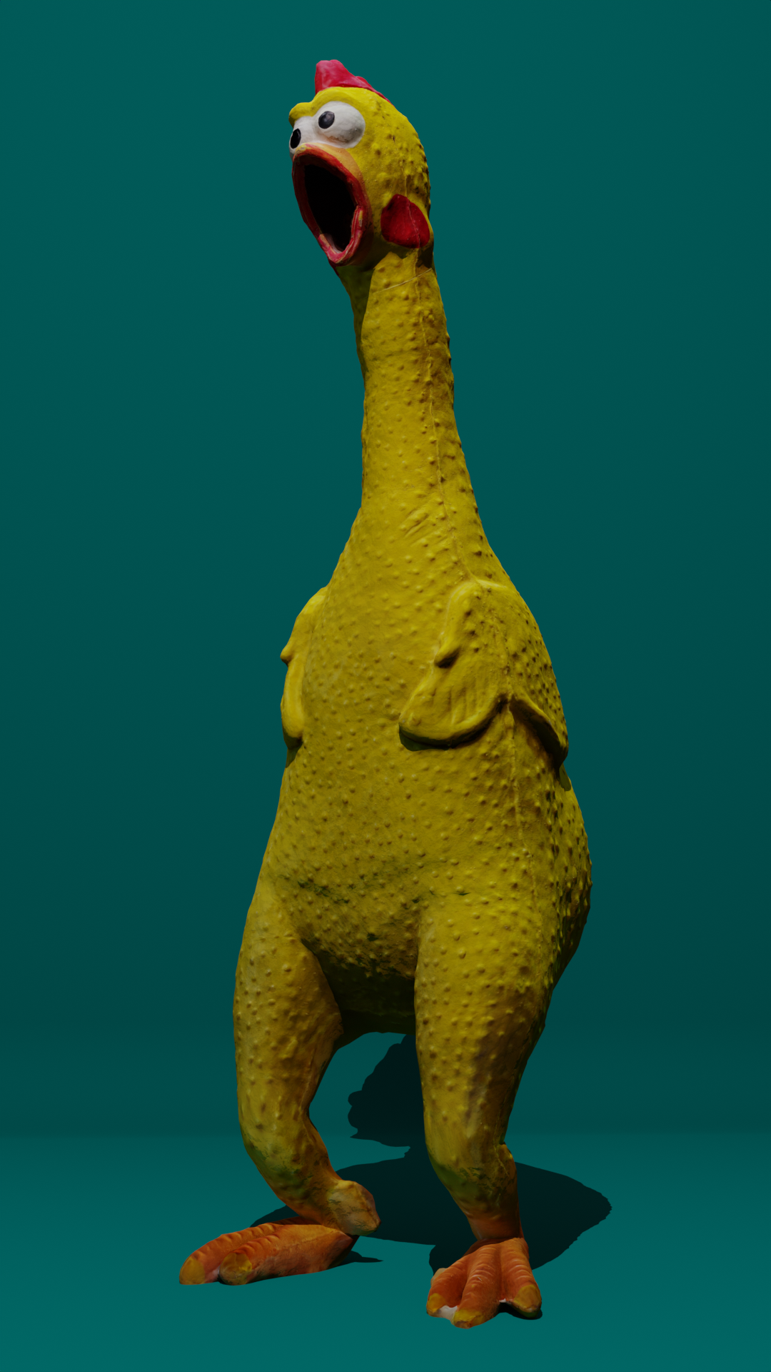 Yellow rubber chicken with open beak against a teal background.