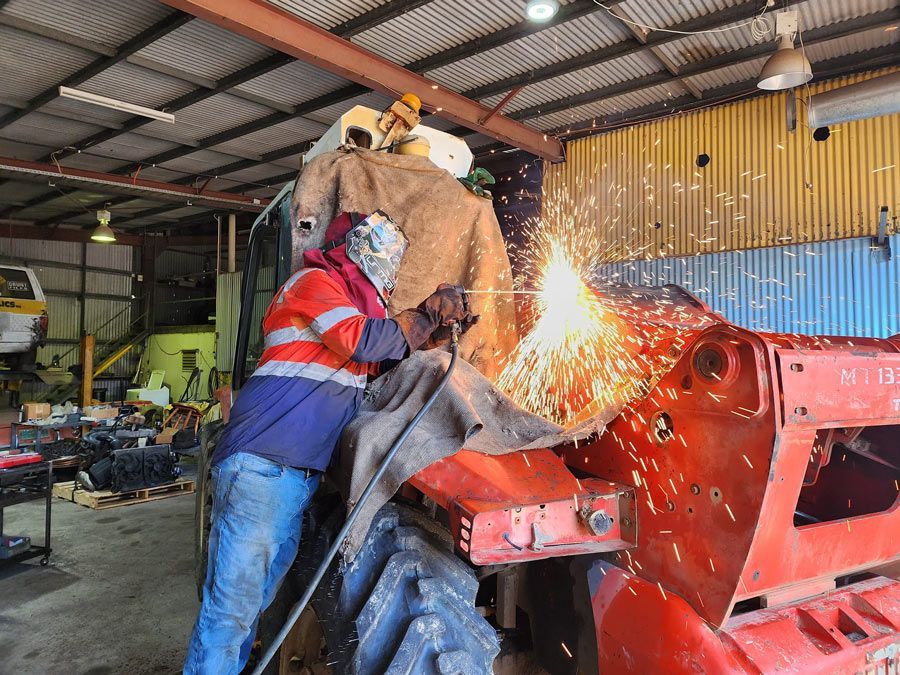 Welding Process On Heavy Equipment — Rowdraulics NQ Pty Ltd in Mount Louisa, QLD