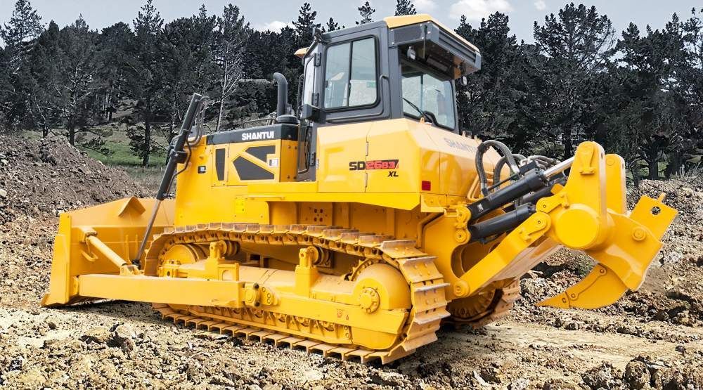 A Yellow Bulldozer is Sitting on Top of a Dirt Field — Rowdraulics NQ Pty Ltd in Mount Louisa, QLD