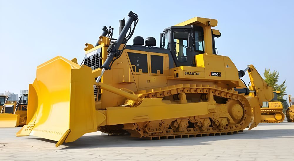 A Yellow Bulldozer is Parked on the Side of the Road — Rowdraulics NQ Pty Ltd in Mount Louisa, QLD