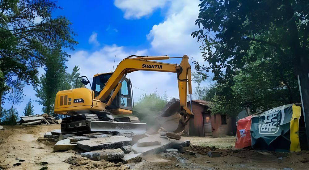 A Yellow Excavator With the Word North on It — Rowdraulics NQ Pty Ltd in Mount Louisa, QLD