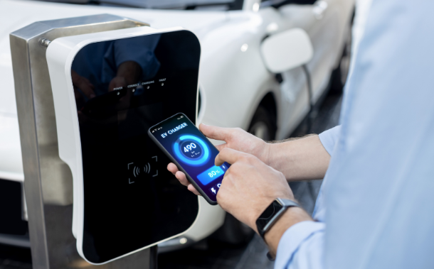 holding smart phone display for ev charging - myevexpert
