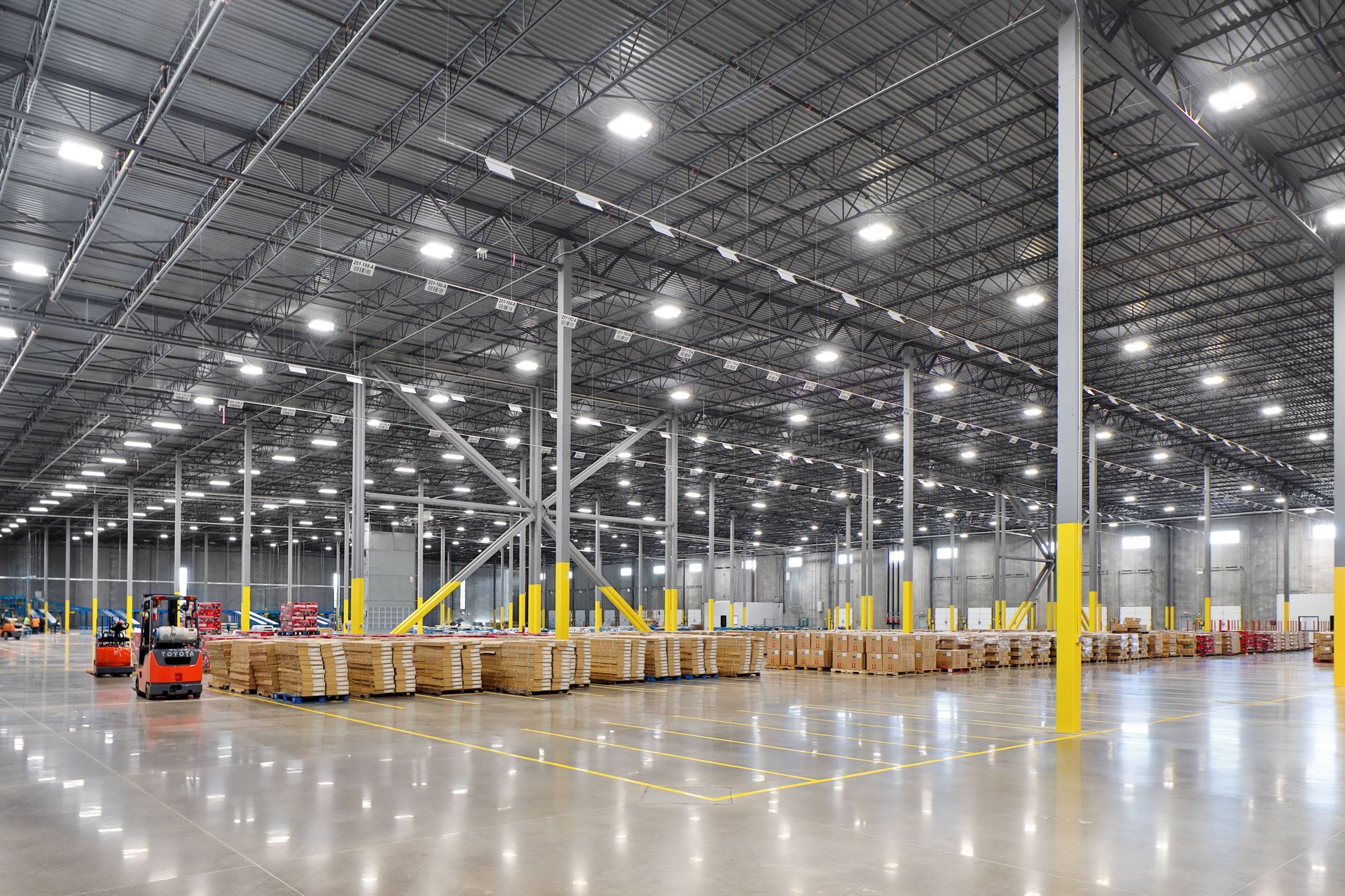 An industrial warehouse with a concrete coating on the floor at Resilient Concrete Coatings near Cypress, TX