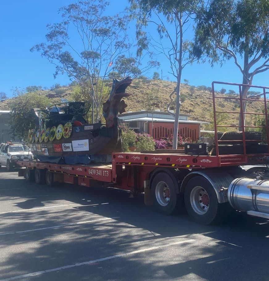 A Red Semi Truck With A Tractor — Territory Towing & Transport In Alice Springs, NT