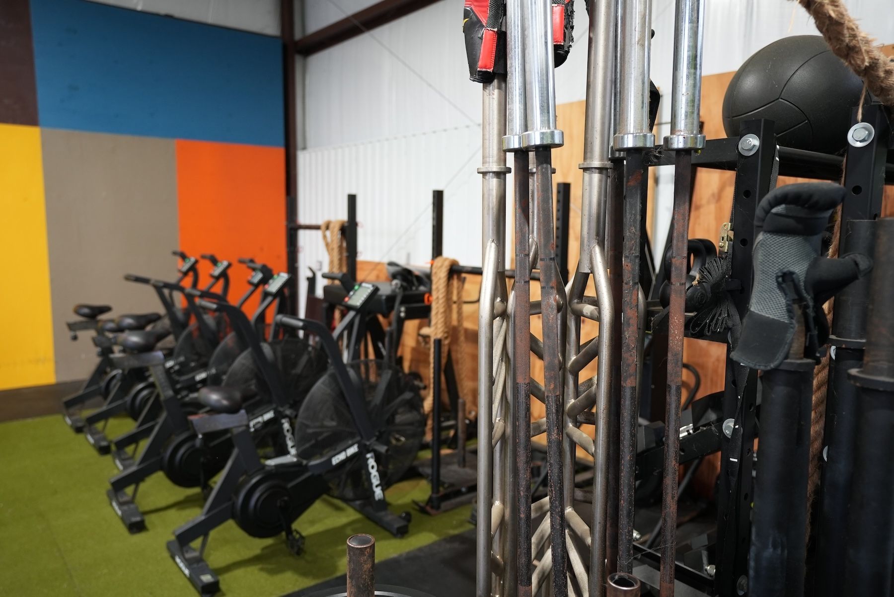 A row of exercise bikes at CrossFit Threshold gym