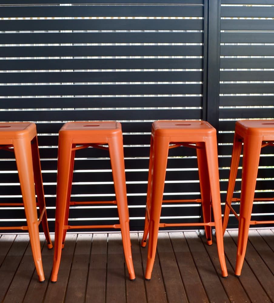 Matt Orange Bar Stools And Grey Screening - Privacy Screen in Newcastle, NSW