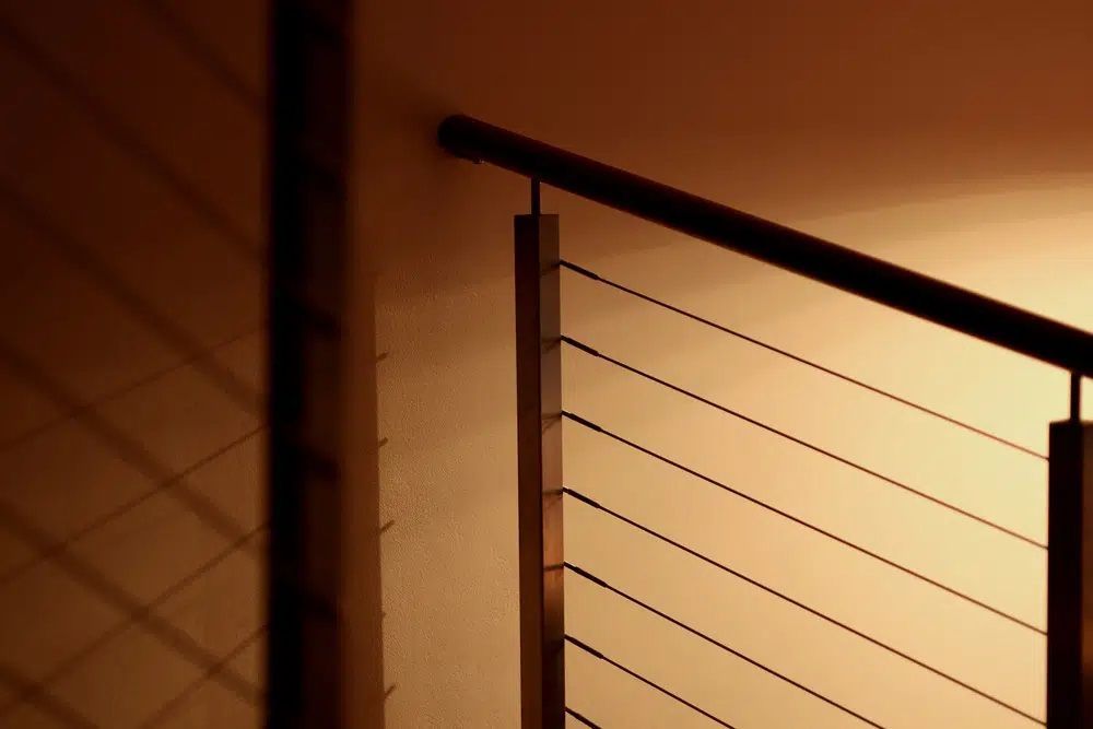 Stair Railing In A Dark Room - Wire Balustrade in Newcastle, NSW