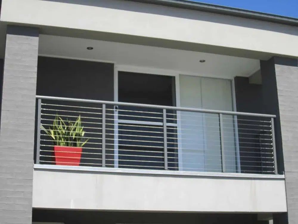 Balcony With Railings And Potted Plants - Aluminium Balustrade in Newcastle, NSW