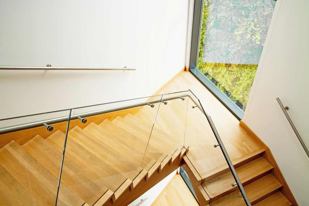Elegant Wooden Stairs And Glass Balustrades