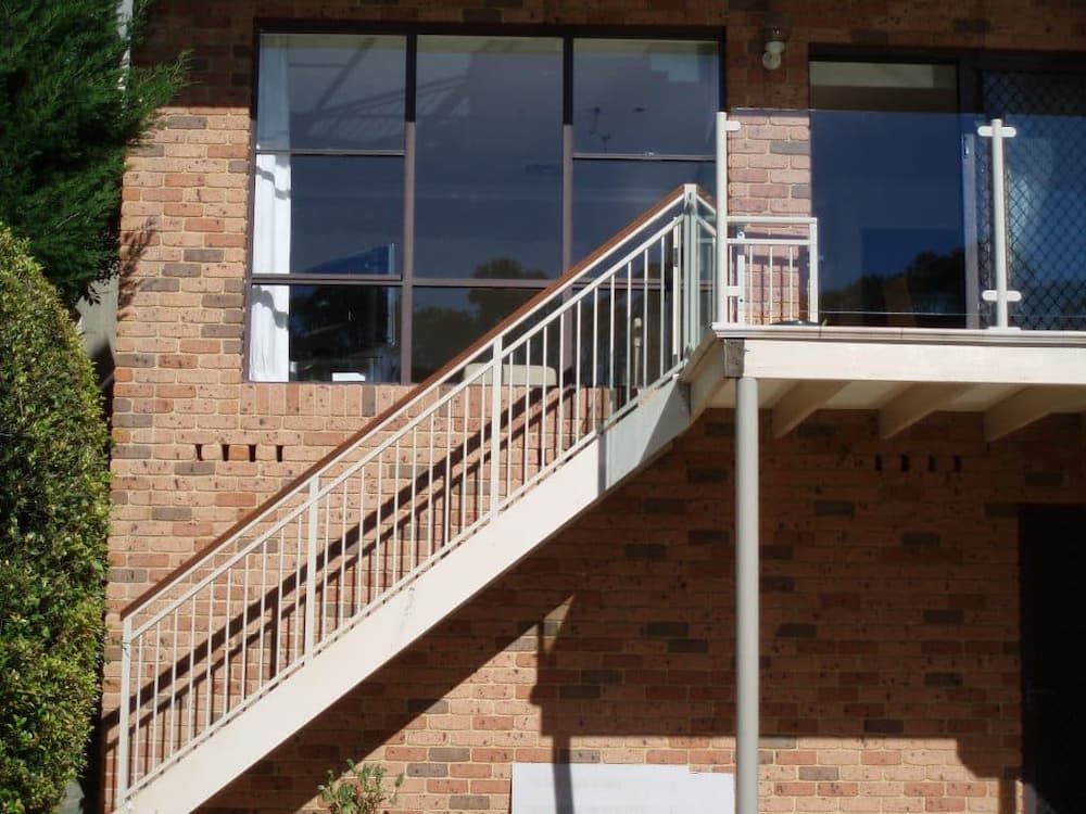 Staircase with Wooden Hand Rail - Balustrade in Maitland, NSW