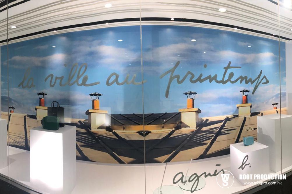 Shop window display, featuring a spring-themed design with text 