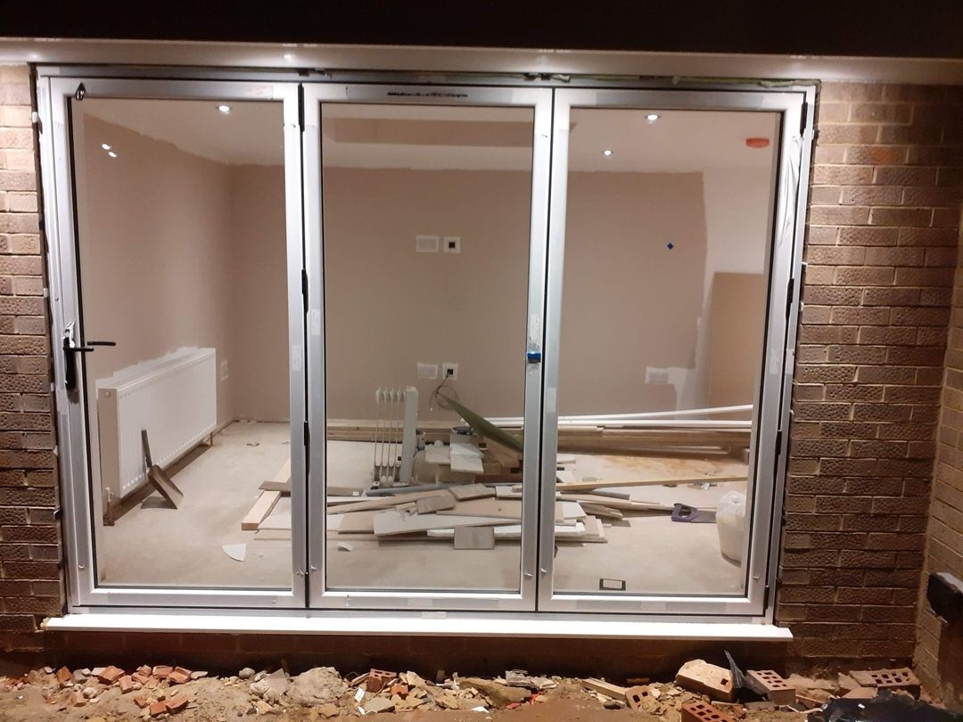 Aluminium Bifolding Doors Open Out, Energy Efficient Double Glazing, High Security Locking Hardware.