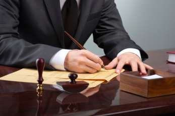 Attorney Signing Documents — Law Firm in Hudson, FL