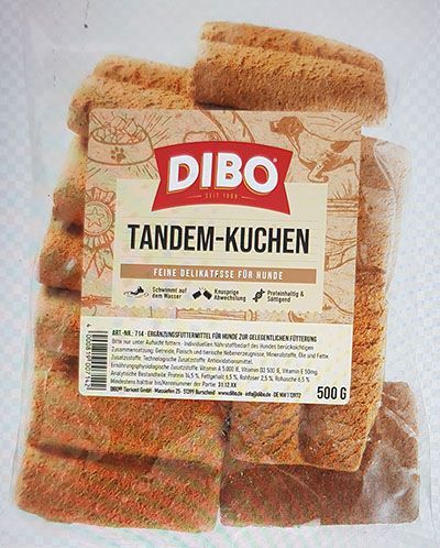Bild von der Tandem-Kuchenverpackung. Sieht aus wie eine Tüte Aufbackbrötchen. Man sieht die Kuchen durchschimmern. Der Aufkleber sagt: