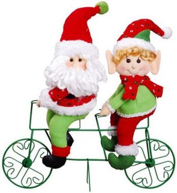 Bild von einem Weihnachtsmann und ein Weihnachtsknecht auf einem grünen Tandem