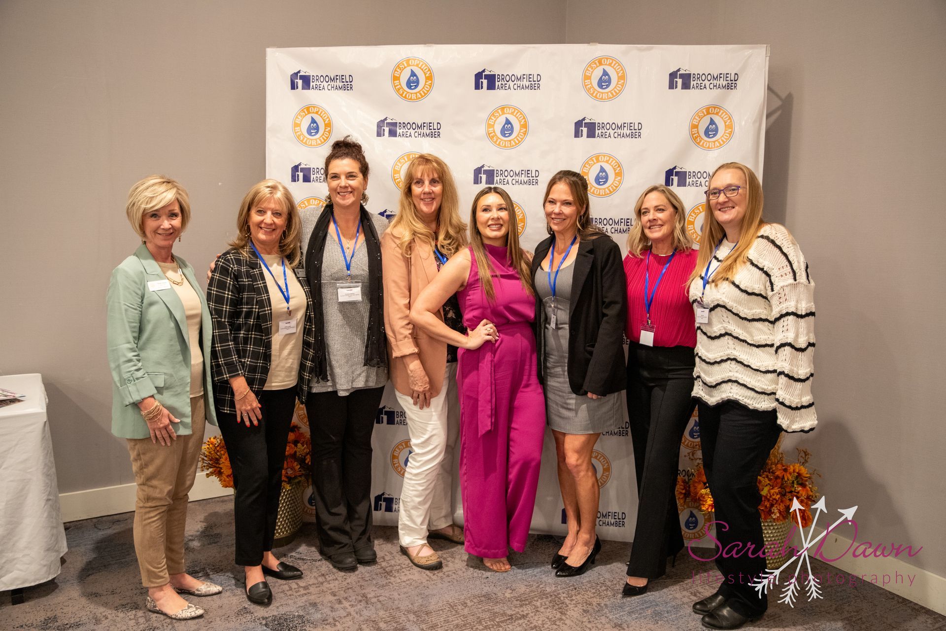 A group from the Broomfield Chamber of commerce posing for a picture in front of Allied Medical Aesthetics