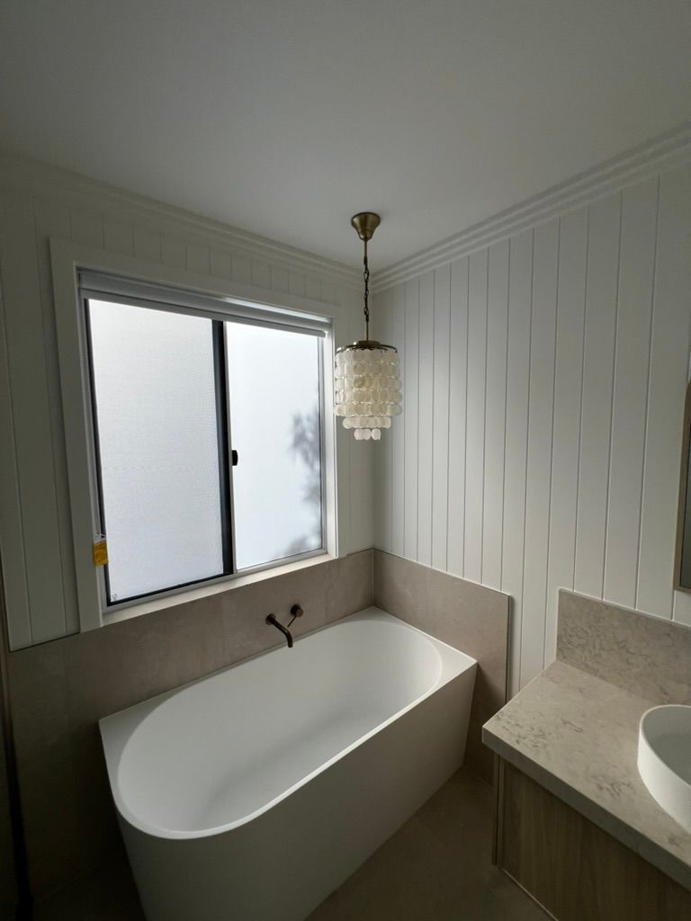 A Hallway With a Ceiling That Has Holes in It — Poljak Plasterers in Rosslea, QLD