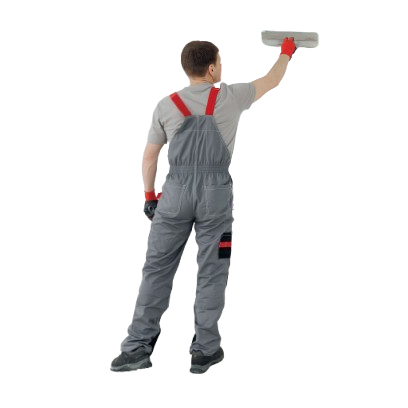 A Man in Overalls is Plastering a Wall With a Trowel — Poljak Plasterers in Bushland Bach, QLD