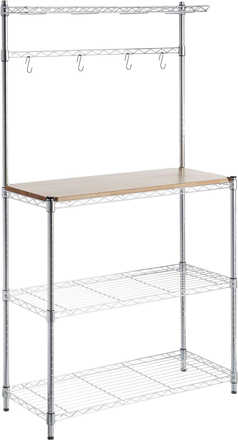 A metal bakers rack with a wooden top and hooks.