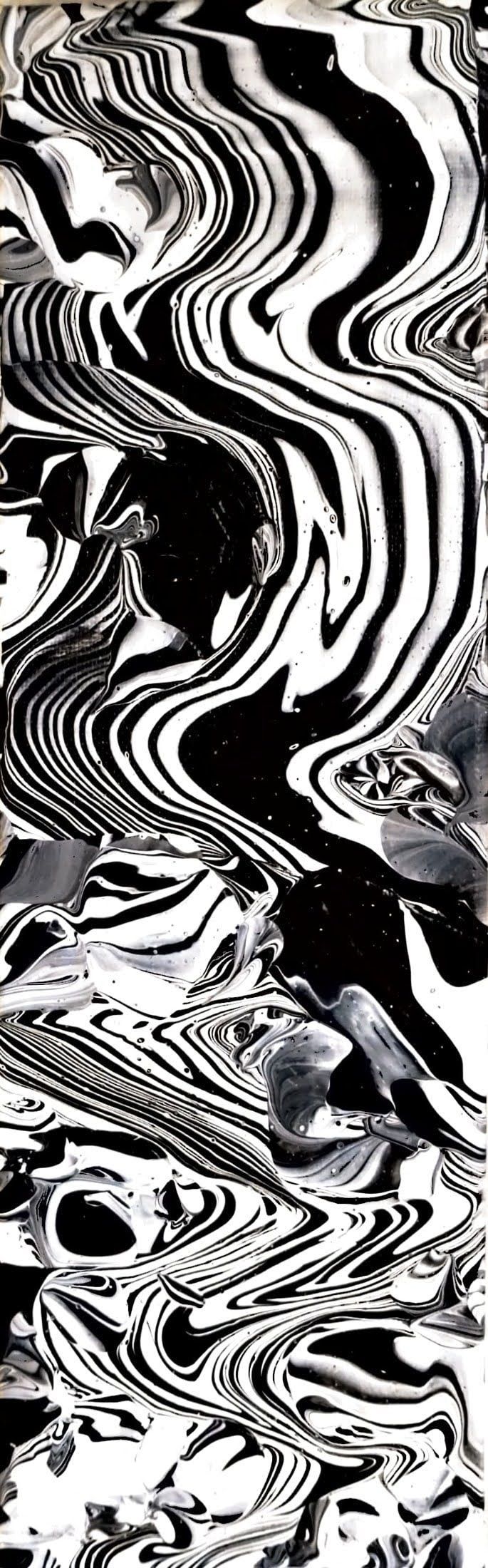 A black and white photo of a zebra print.