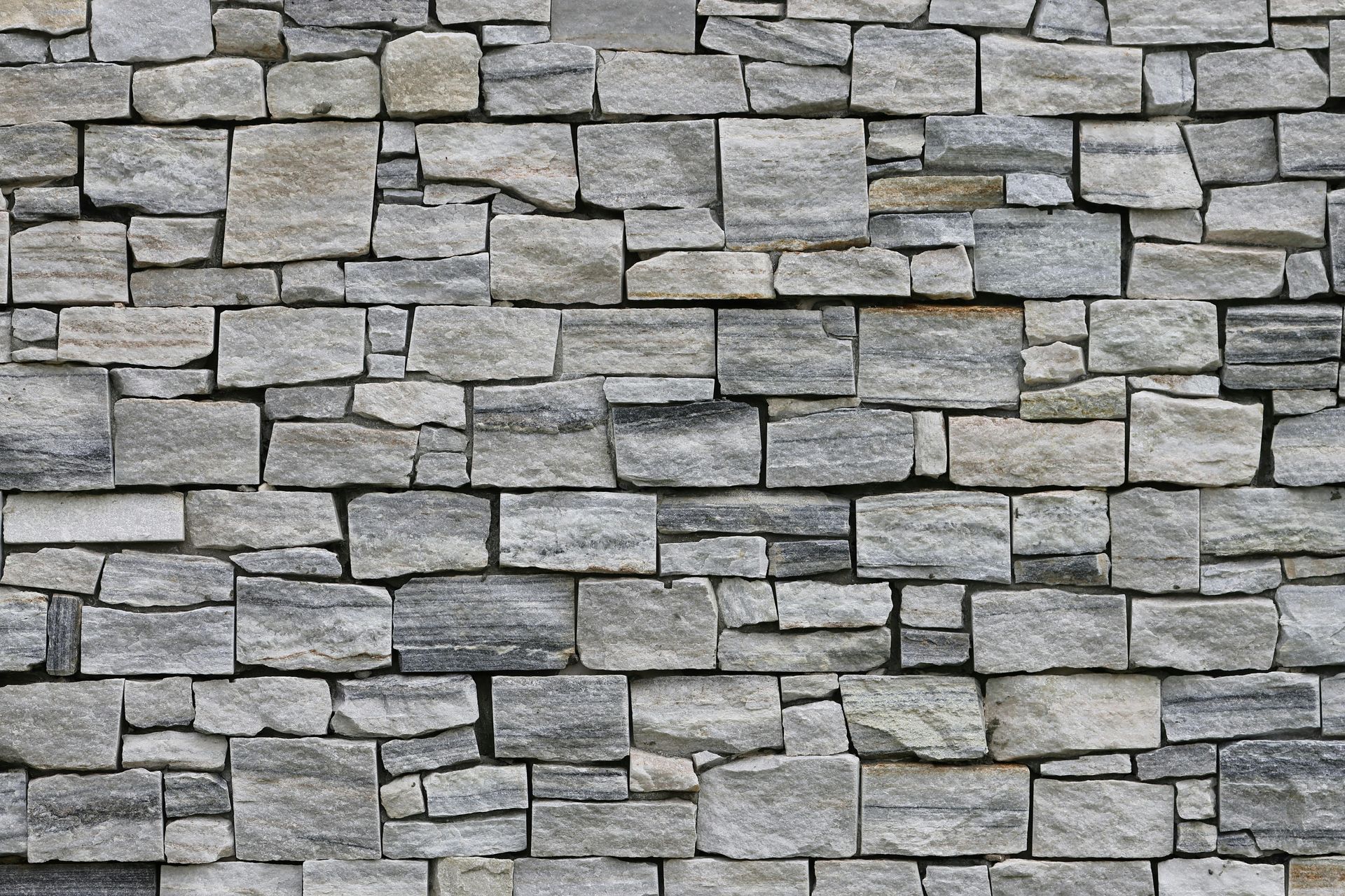 White textured surface with visible brushstrokes.