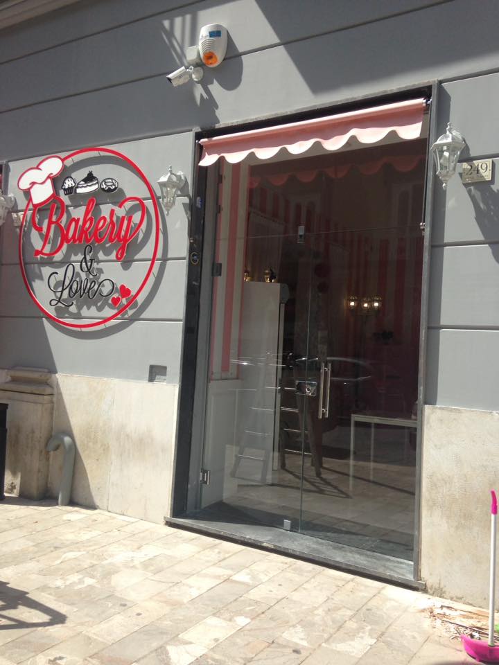 porta di vetro per attività commerciali