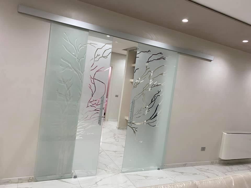 porta scorrevole in vetro