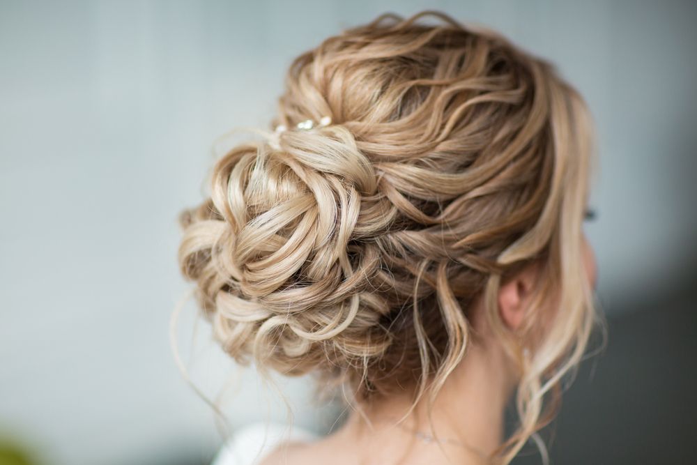 Intricate Blonde Updo Hairstyle With Loose Curls Pinned at the Back of the Head — @miilan in Darwin City, NT