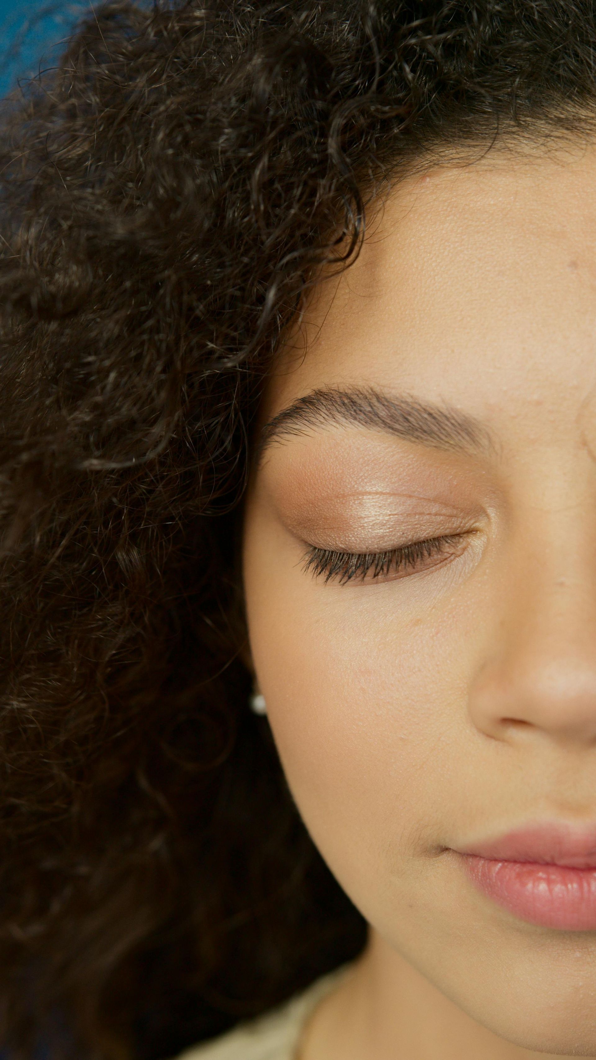 Gloved Esthetician Applies Treatment to a Client’s Eyebrow and Forehead — @miilan in Darwin City, NT