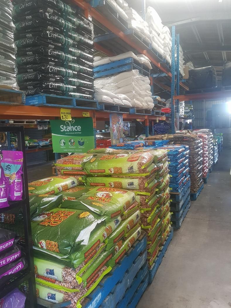 A Warehouse Filled With Lots of Bags of Fertilizer — NQ Stockfeeds & Farm Supplies in Mareeba, QLD