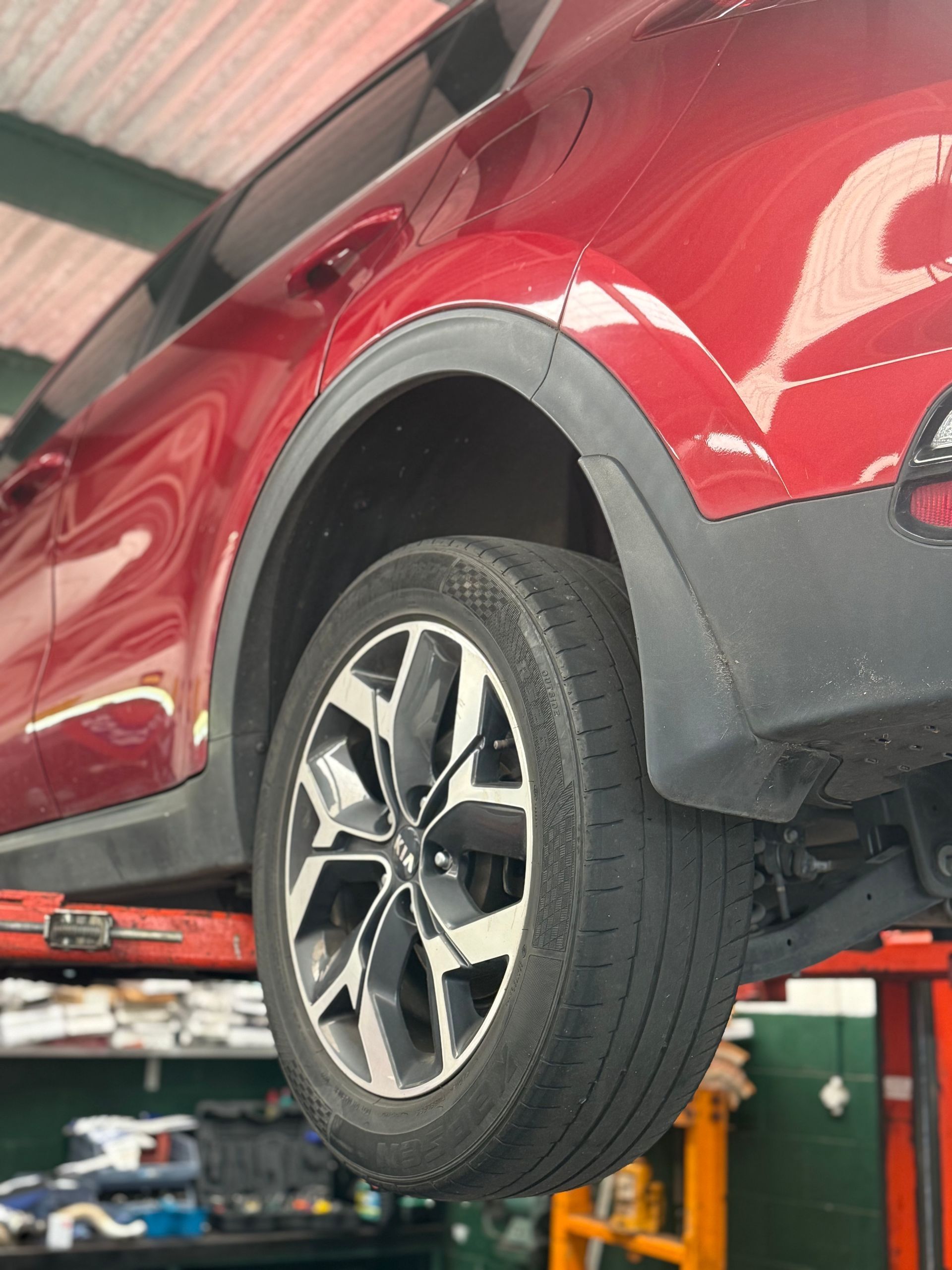 A Car is Being Adjusted on a Machine in a Garage — Fix-It Automotive in Fairy Meadow, NSW