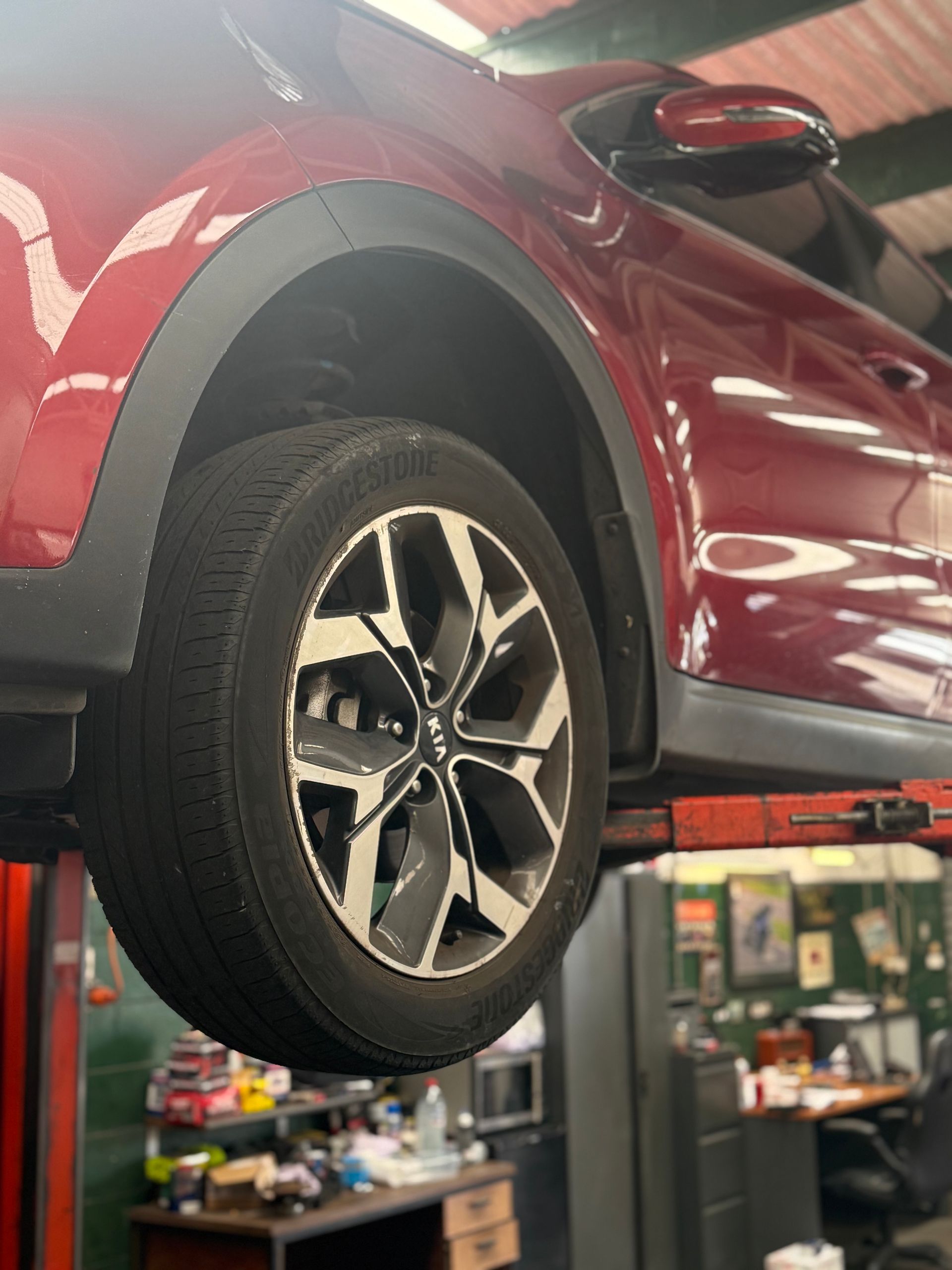 A Diagnotic Tool Is Being Used Next To A Car — Fix-It Automotive in Fairy Meadow, NSW